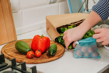 Preparing healthy meals in home kitchen. Health-conscious changes, weight loss, detox, diet, New Years resolutions kick in