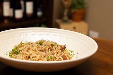 Duck rice with peas and spices