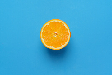orange on blue background. top view,copy space