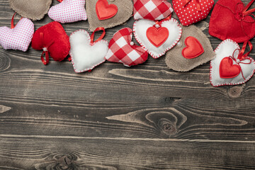 Handmaded hearts on wooden background. Valentine's day card