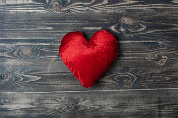 Love red heart on wooden texture backround