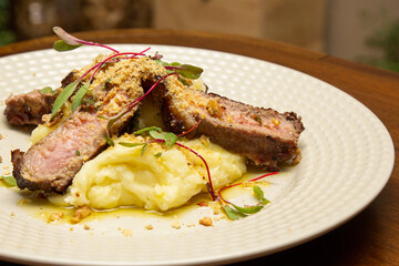 Ancho with Aligot, Chimichurri and fried pork flour.