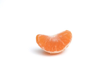 Slice of tangerine on a white background