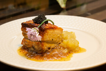 Pork belly with green apple puree and caviar