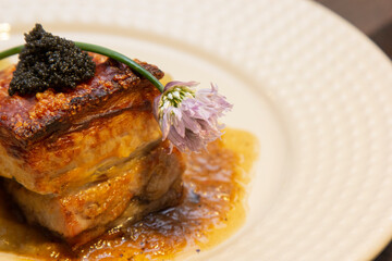 Pork belly with green apple puree and caviar