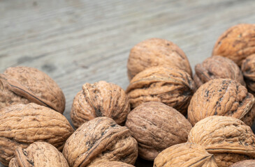 Walnuts on a wooden board.