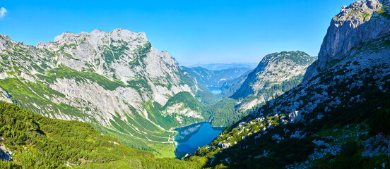 Fototapeta na wymiar Upper Lake Gosau, Gosaulacke and Lake Gosau with Panoramic mountain landscape in Austrian Alps. 