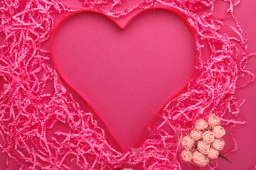 Pink background volumetric heart made of paper and ribbons and pink paper decor.
