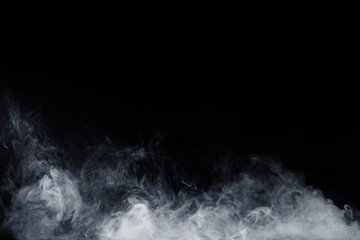 Fototapeta na wymiar Abstract white smoke moves on black background. Swirling smoke.