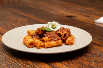 Rigatoni pasta with lamb sauce and ragout.