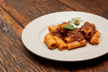 Rigatoni pasta with lamb sauce and ragout.
