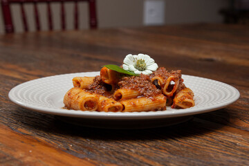 Rigatoni pasta with lamb sauce and ragout.