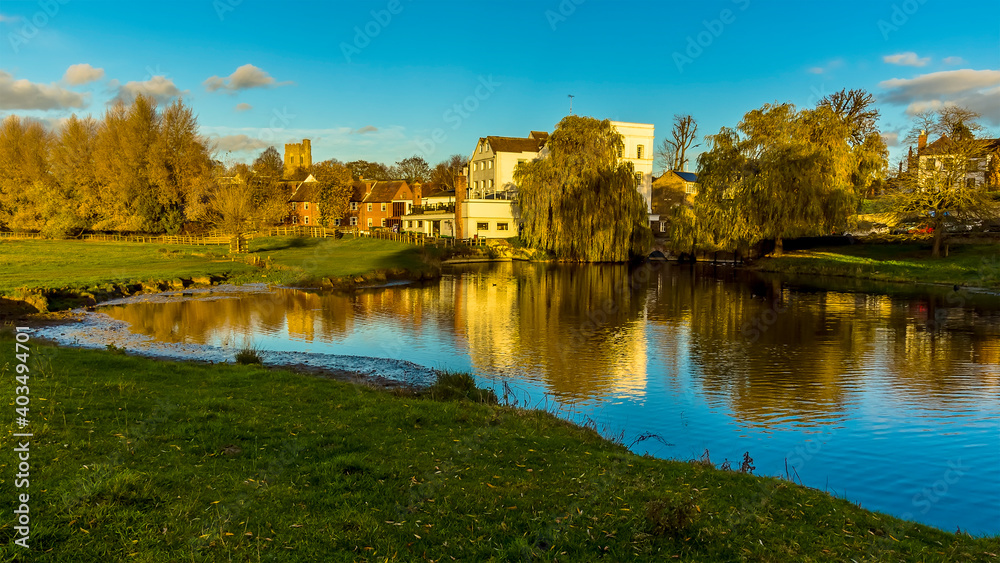 Wall mural a view across the river stour towards the western edge of sudbury, suffolk