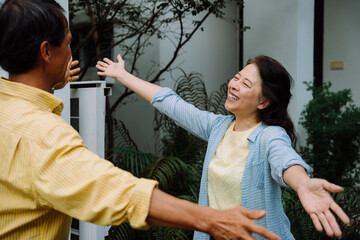 Senior couple embracing their lover after get home.