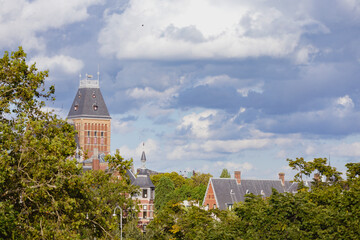 Obraz premium cloudy sky over the church in the city, Amsterdam, europe, church of st. john baptist