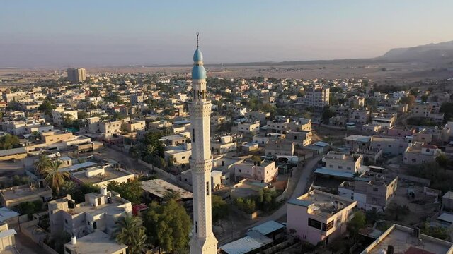 Mosque Tower minaret in Jericho city with Birds- aerial view
Drone view of Jericho city,sunset, Jordan Valley, Israel/palestine
