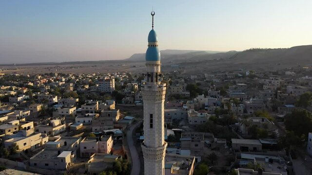 Mosque Tower minaret in Jericho city with Birds- aerial view
Drone view of Jericho city,sunset, Jordan Valley, Israel/palestine
