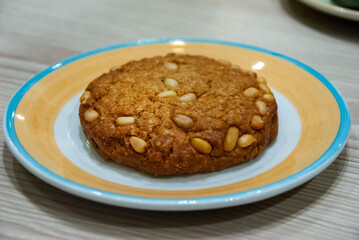 Russian style oatmeal cookie with pine nuts in Saint Petersburg, Russia