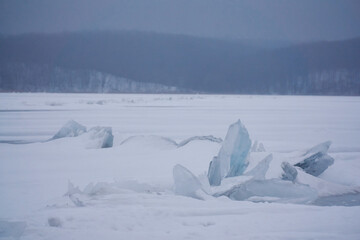 Frozen surface of the Voronezh reservoir in winter