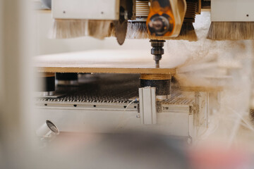 Selective focus shot of chipboard milling machine