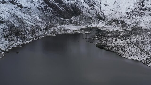Aerial view of Llyn Idwal in Snowdonia Wales UK with snow