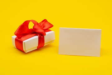 gift craft box on a yellow background. Valentine's Day.