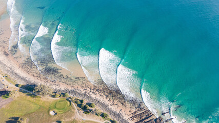 Aerial view of perfect waves at crescent head, Australia