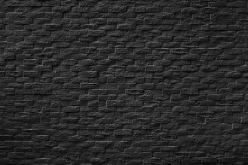 Black stone brick wall texture.