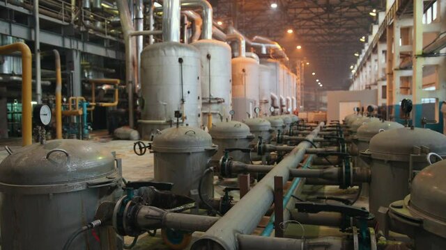 Manometer pipes and valve in boiler room. Thermal power plant piping at modern factory. Sugar beet production plant
