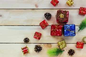 Christmas gift box on the wooden floor.