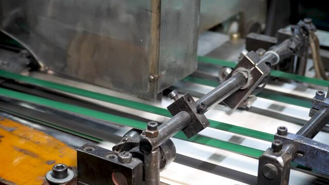 Paper newspaper or tabloid print on plant factory, conveyor belt line after printing