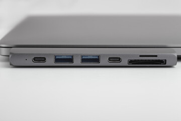 Close-up photo of type-c hub and laptop