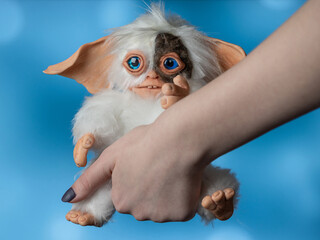 toy Gremlin Gizmo, hand made in a mixed technique from faux fur and polymer clay