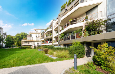 Residential area with ecological and sustainable green residential buildings, low-energy houses with apartments and green courtyard