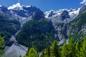 Fototapeta na wymiar Mountain landscape along the road to Stelvio pass at summer
