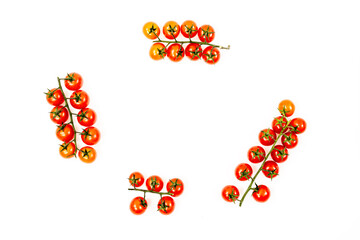 bunches of cherry tomatoes on white background