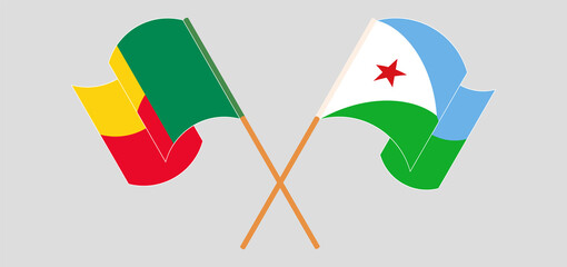 Crossed and waving flags of Djibouti and Benin