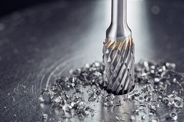 Milling сutter and drill bit make sink in hole in steel billet. Locksmith work.