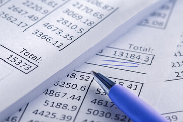 Obraz premium Accounting document with pen and checking financial chart. Concept of banking, financial report and financial audit.