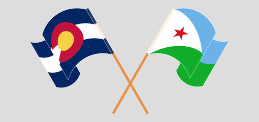 Crossed and waving flags of The State of Colorado and Djibouti