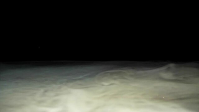 Abstract white smoke in slow motion. Smoke, Cloud of cold fog in light spot background. Light, white, fog, cloud, 4k, ice smoke cloud. Floating fog. alpha channel , Green screen backround. Chroma key.