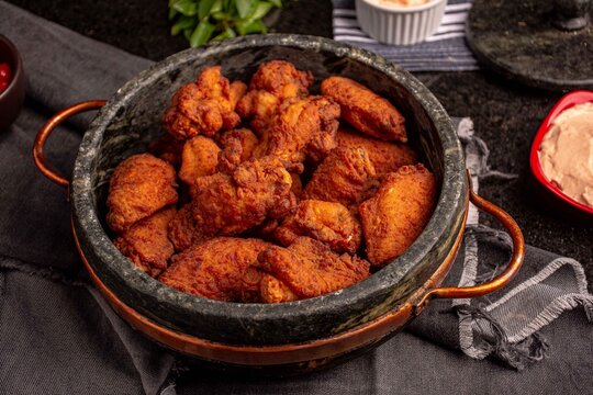 Frango empanado e frito