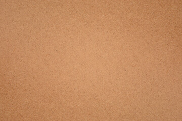 Sheet of brown paper texture for background.