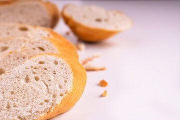 Isolated clipping path white background of organic flour mixed gold brown bread homemade baked italian ciabatta french toast baguette whole wheat rye oat loaf with healthy seed gluten free