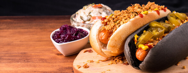 American traditional fast food Hotdog with fresh organic bread bun white wheat and black charcoal...