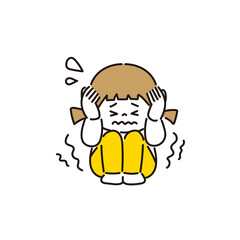 耳をふさぎ目を閉じて怖がる女の子