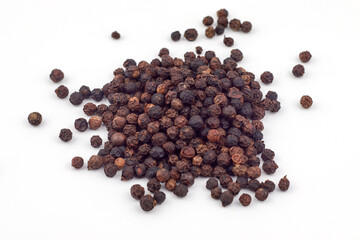 Black pepper on a white background