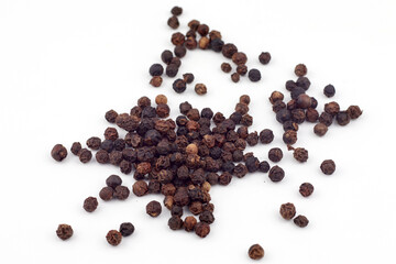 Black pepper on a white background