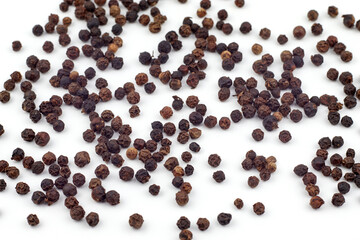 Black pepper on a white background