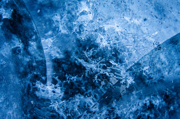 Close up of blue glaicer ice, in Icelandic ice cave during winter.